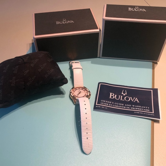 Bulova ladies rose gold with diamond accent white leather watch. - Picture 3 of 7